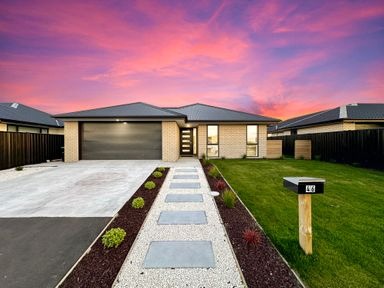 Single-level home at sunset